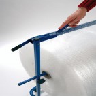 Dérouleur avec cutter intégré